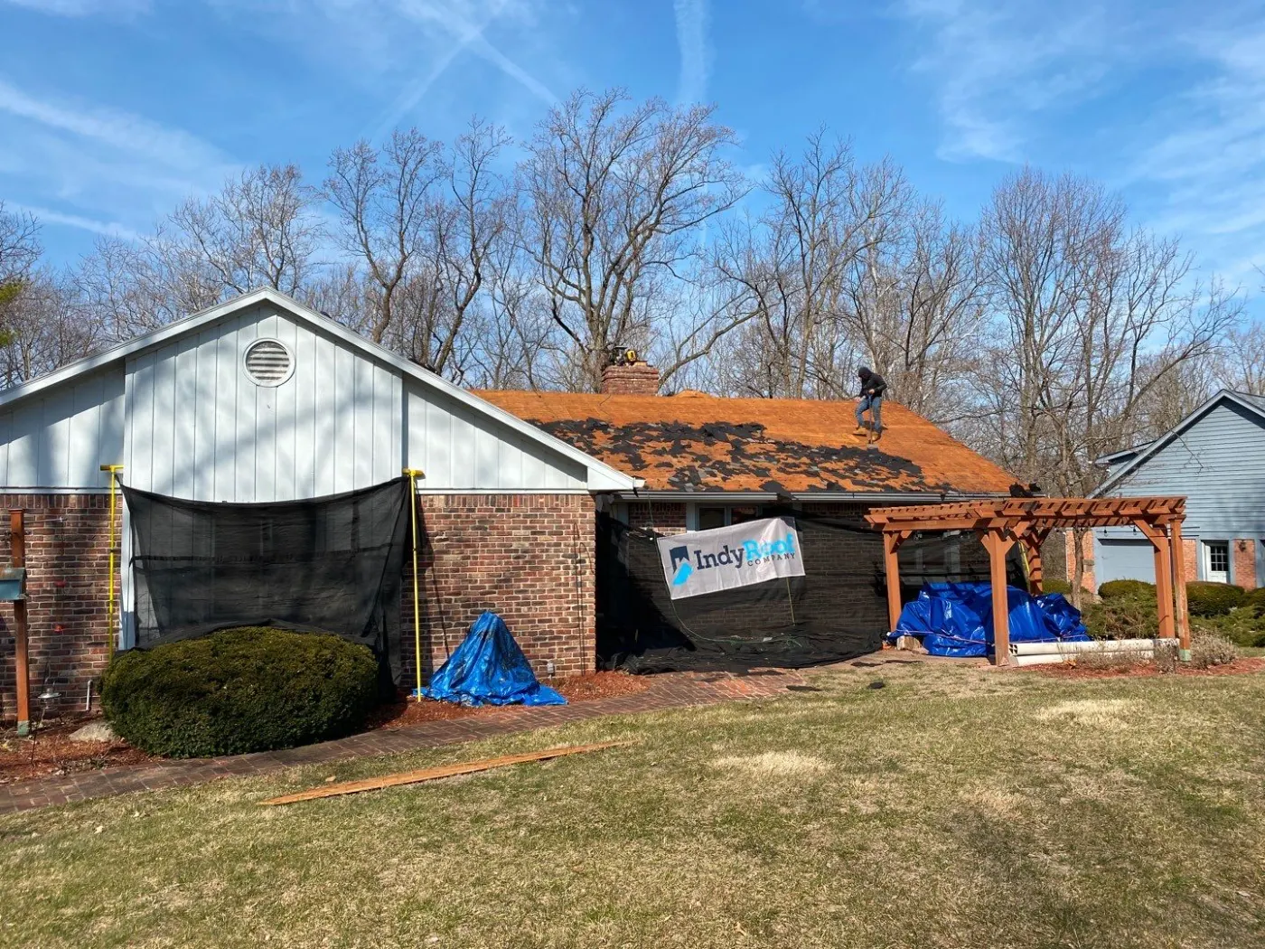 Tarping and dry-in on a Merrimac commercial roof